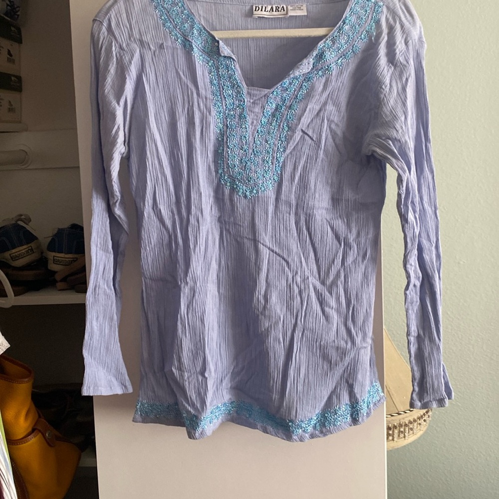 One of a kind cotton embellished long sleeve blouse made in India.